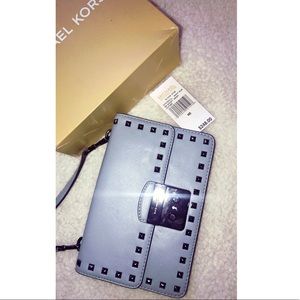 Brand new blue grey Michael Kors purse with tags!